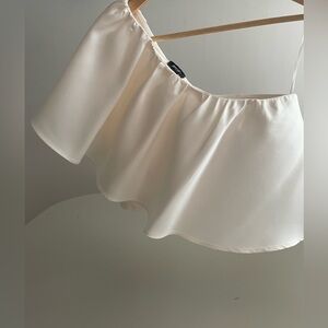NastyGal Satin Off-Shoulder Ruffled Crop Top in Ivory